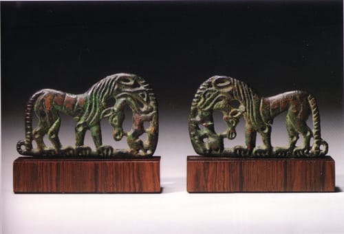 A Pair of Ordos Bronze Buckle Plaques, 500 BCE - 100 BCE