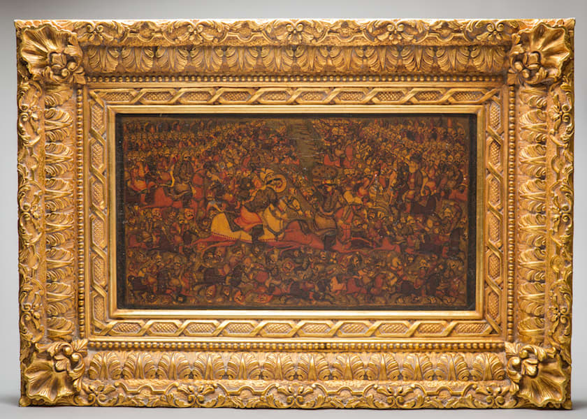 Qajar lacquer painting within an ornate gild wooden frame