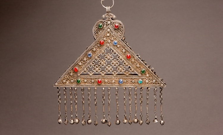 Triangular perforated Turkoman silver and carnelian chest pendant
