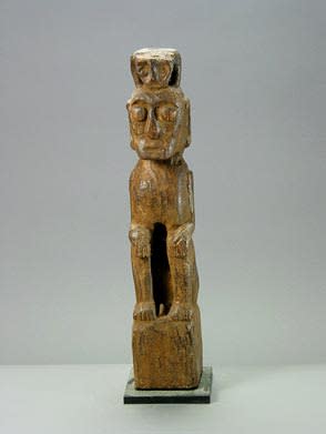 Indonesian Wooden Sculpture of a Seated Man, 20th Century CE