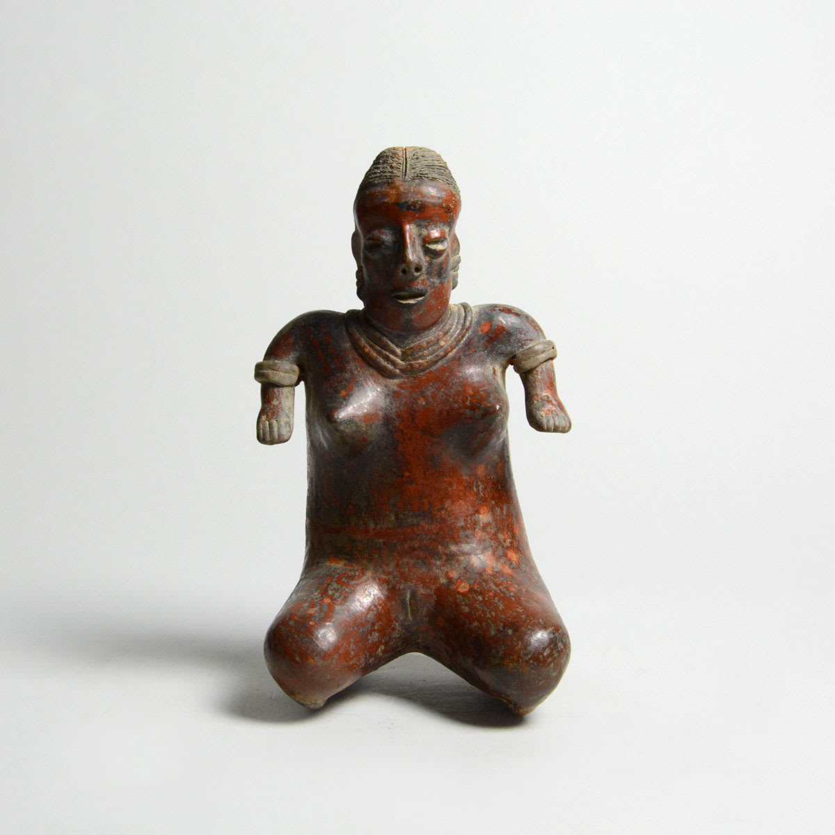 Nayarit Terracotta Sculpture of a Kneeling Woman, 300 BCE - 300 CE