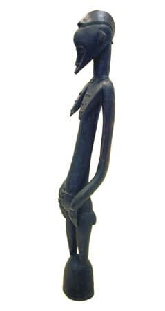 Female Senufo Wooden Pombilele Rhythm Pounder, 20th Century CE