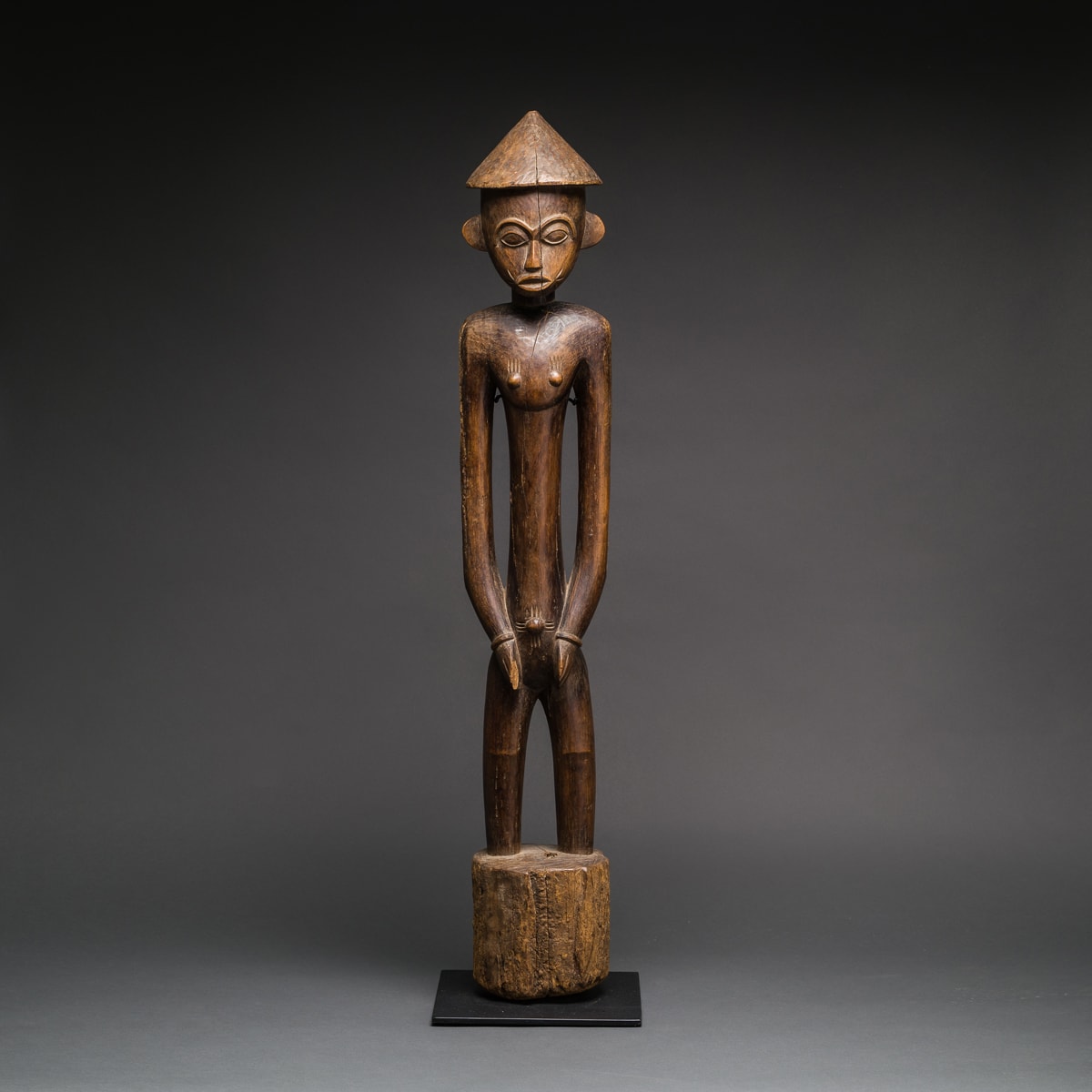 Male Senufo Wooden Pombiele Rhythm Pounder, 20th Century CE