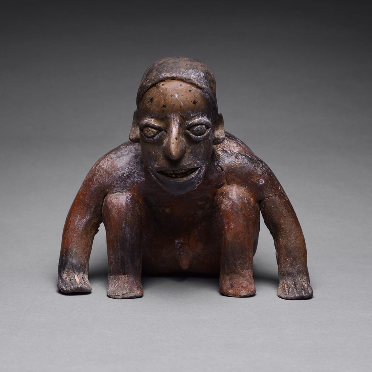 Ameca-Ezatlán Style Jalisco Terracotta Sculpture of a Squatting Hunchback, 300 BCE - 300 CE