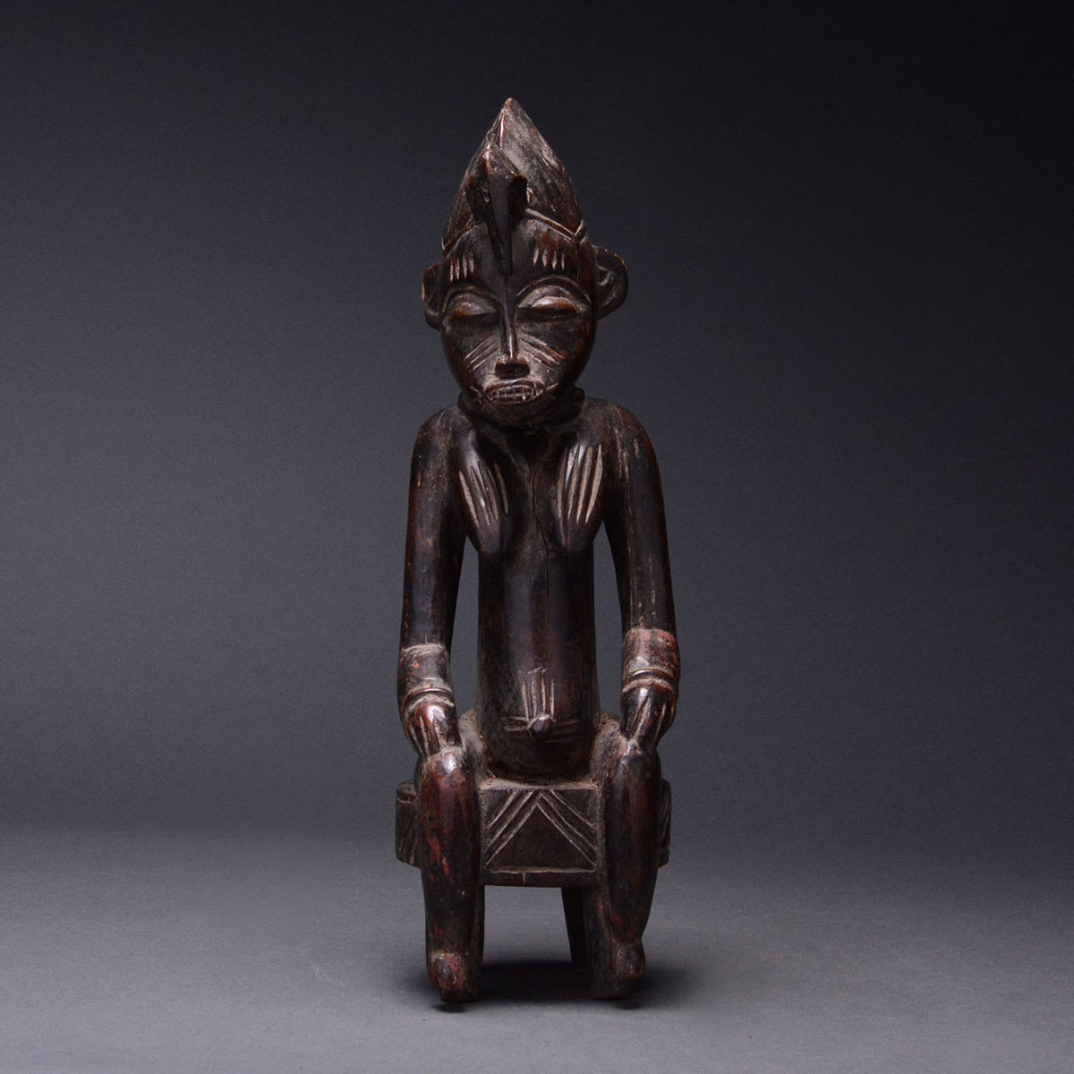 Senufo Wooden Sculpture of a Seated Woman, 20th Century CE