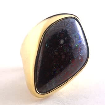 Australian Boulder Opal Ring Weighing 33 Carats Set In A Ring Of 18 Karat Gold