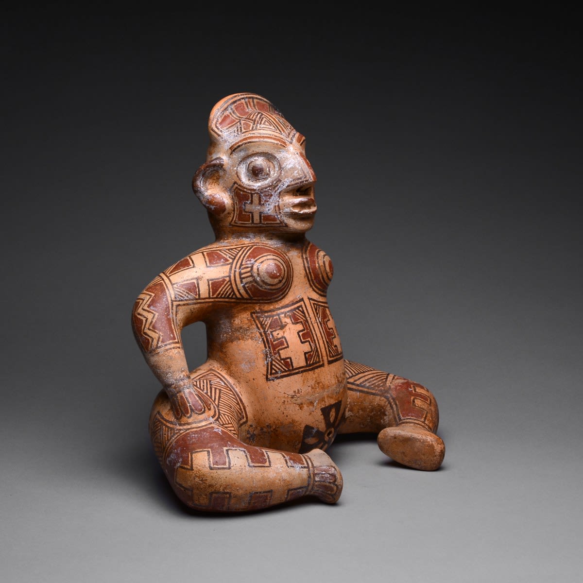 Terracotta Polychrome Seated Female Figure, 500 CE - 1000 CE