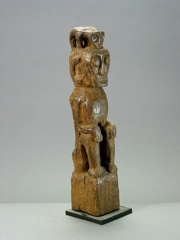 Indonesian Wooden Sculpture of a Seated Man, 20th Century CE