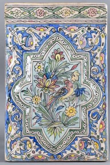 Rectangular glazed tile with floral decoration