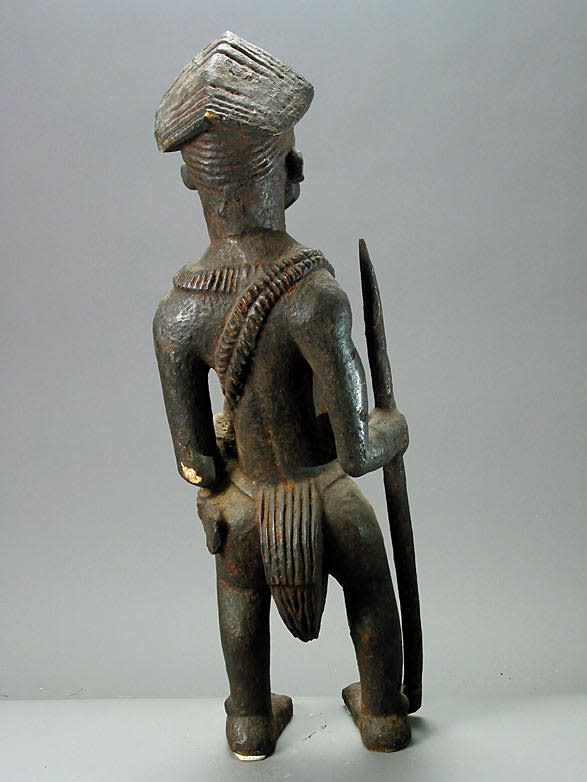 Grasslands Wooden Sculpture of a Warrior/Hunter, 20th Century CE