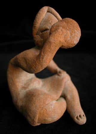 Sculpture of a Seated Woman Looking at a Mirror, 1200 BCE - 900 CE