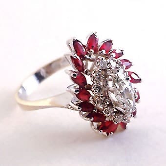 White Gold Ring Featuring Thirteen Diamonds and Sixteen Rubies