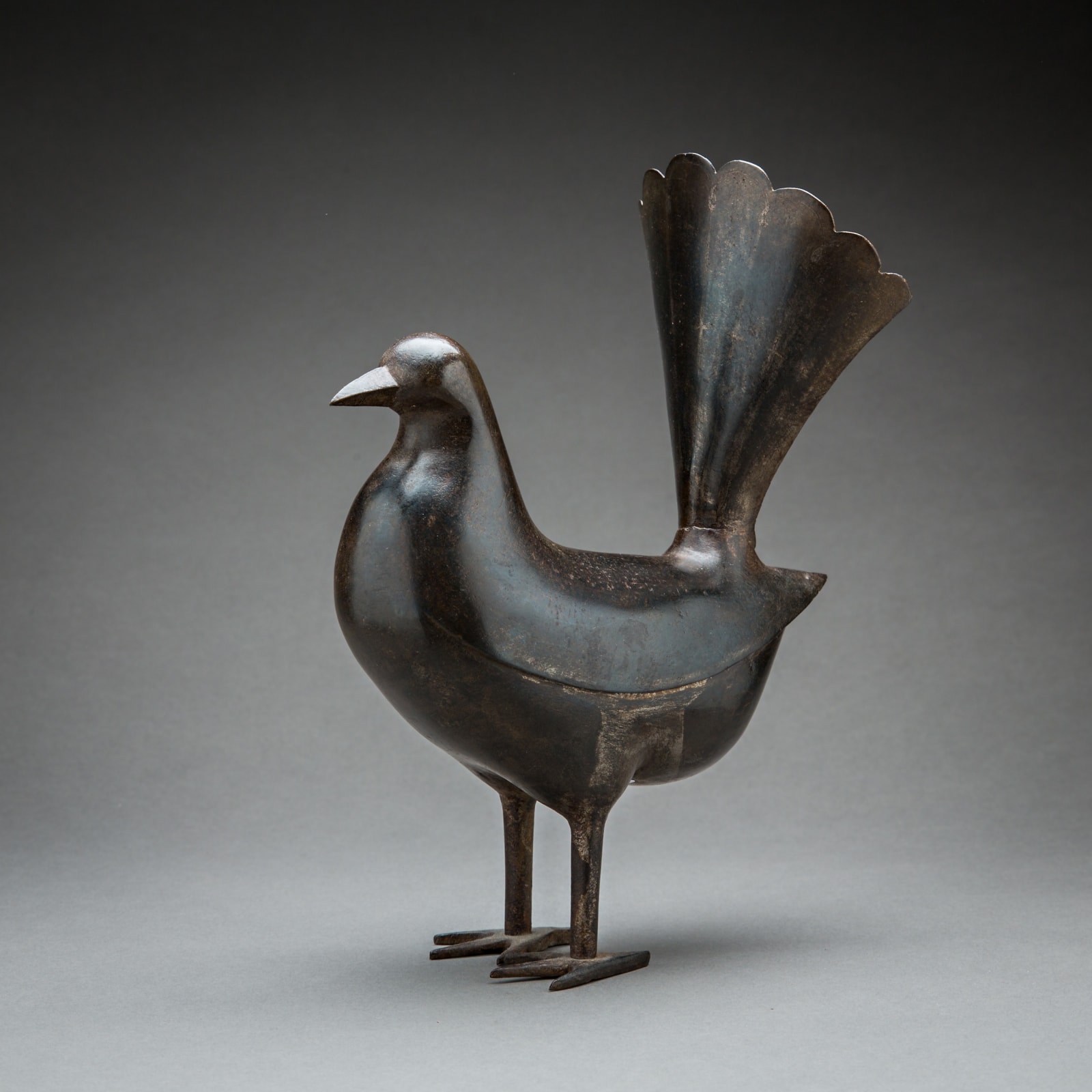 Qajar period gold damascened steel figurine of a dove, 19th Century CE