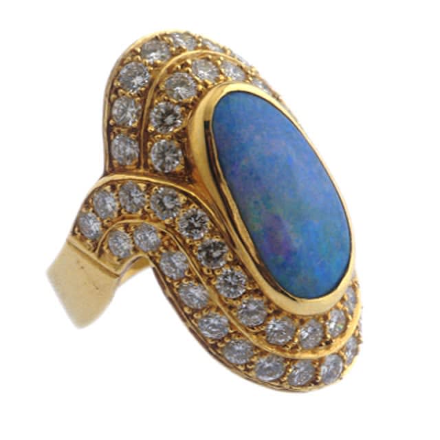 Gold Ring Featuring an Australian Opal Ring Set with Fifty Three Diamonds