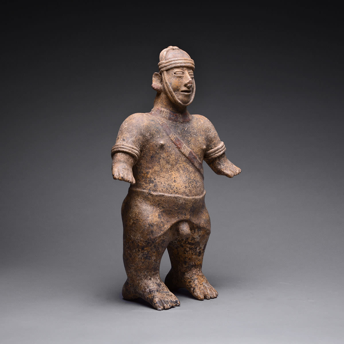 El Arenal Brown Style Jalisco Terracotta Sculpture of a Man Wearing a Helmet, 300 BCE - 300 CE