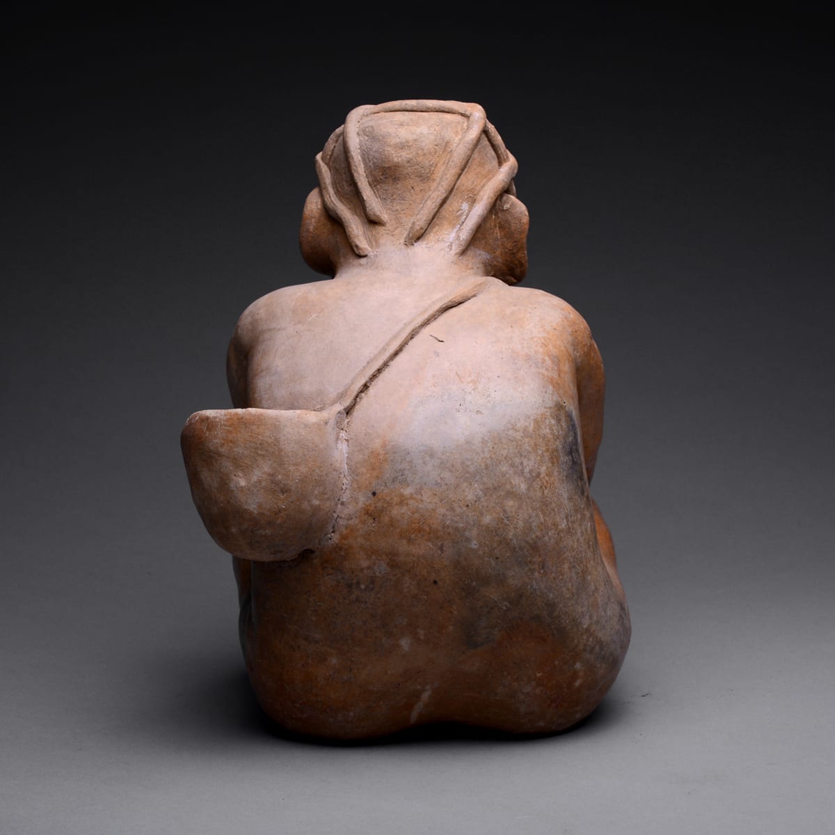 Ameca-Ezatlán Style Jalisco Sculpture of Seated Man, 300 BCE - 300 CE