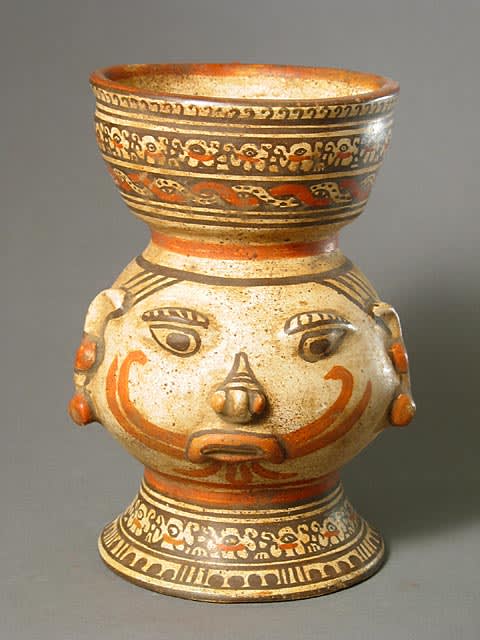 Guanacaste-Nicoya Terracotta Trophy Head with an Appliqué Jaguar, 1200 CE - 1550 CE