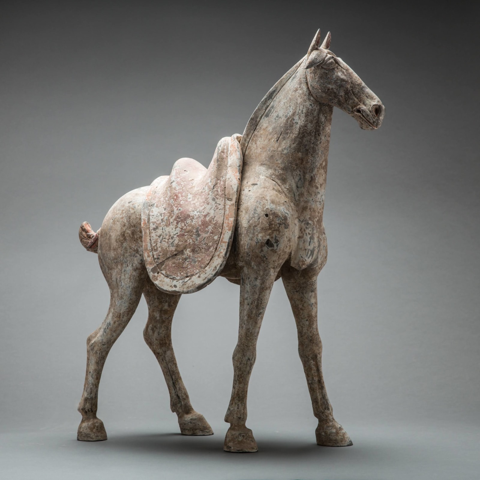 Pair of Tang Sculptures of Horses with Removeable Saddles, 618 CE - 906 CE