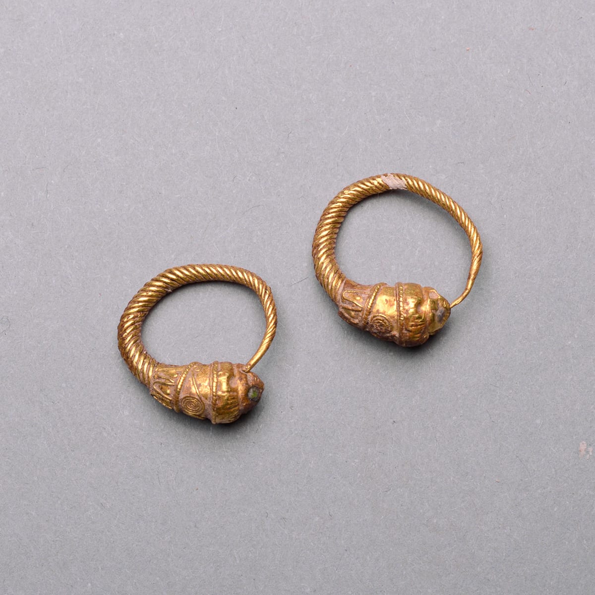 Hellenistic Gold Earrings Adorned with Lion Heads, 300 BCE - 100 CE