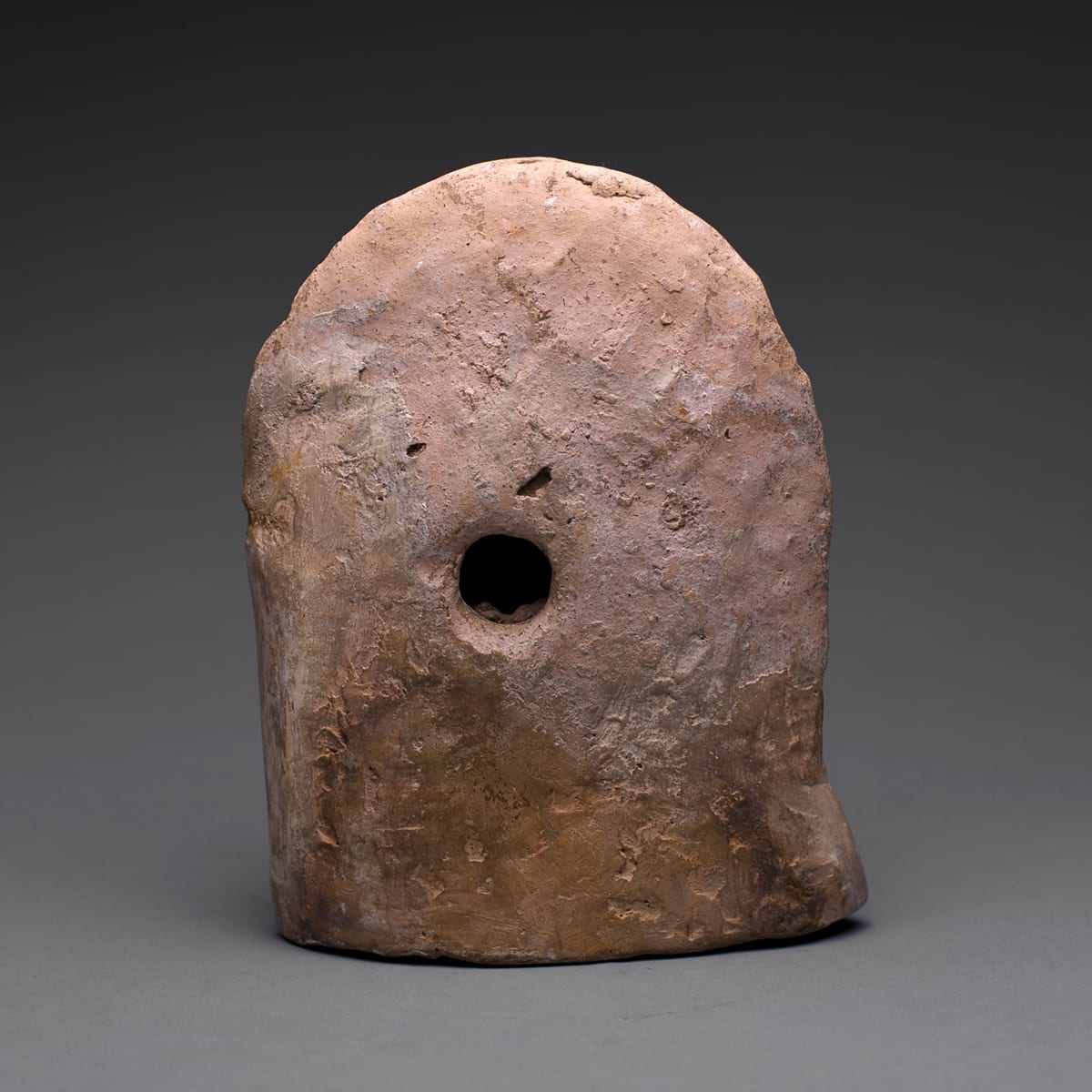 An Etruscan Terracotta Votive Head of a Youthful Man, 4th Century BC to 3rd Century BC