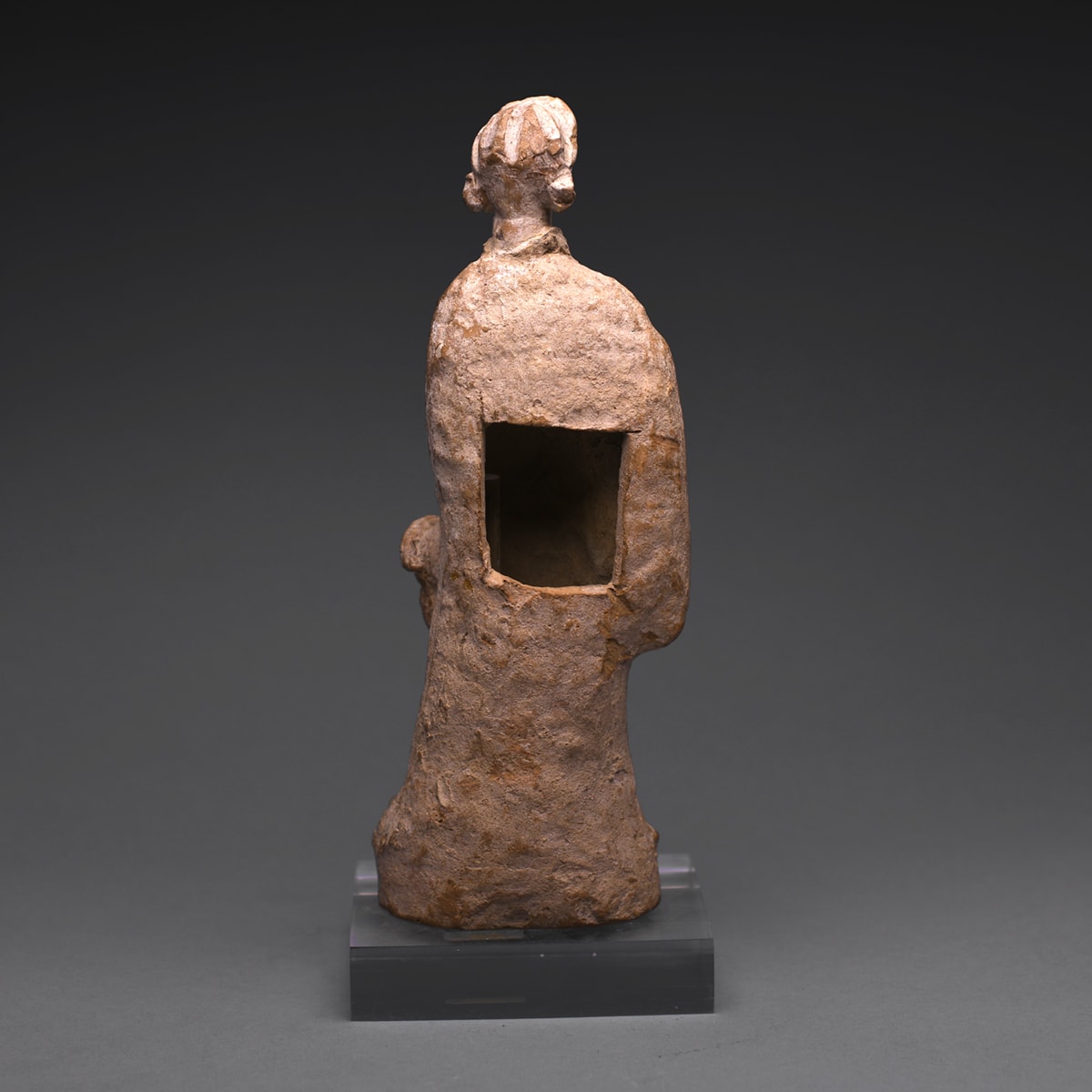 A Hellenistic Limed Terracotta Statue of a Standing Woman, 4th Century BC to 3rd Century BC