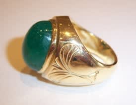 18 Karat Gold Ring Set with a Cabachon Colombian Emerald