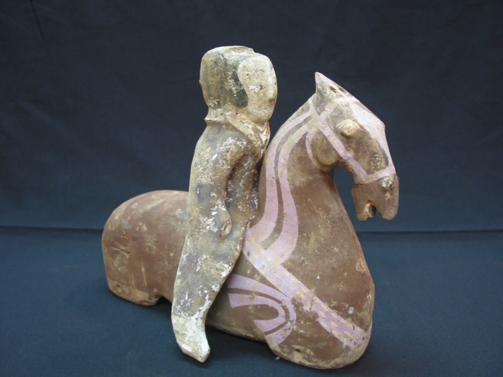 A Pair of Han Dynasty Painted Pottery Seated Horses with Detachable Riders, 206 BCE - 220 CE