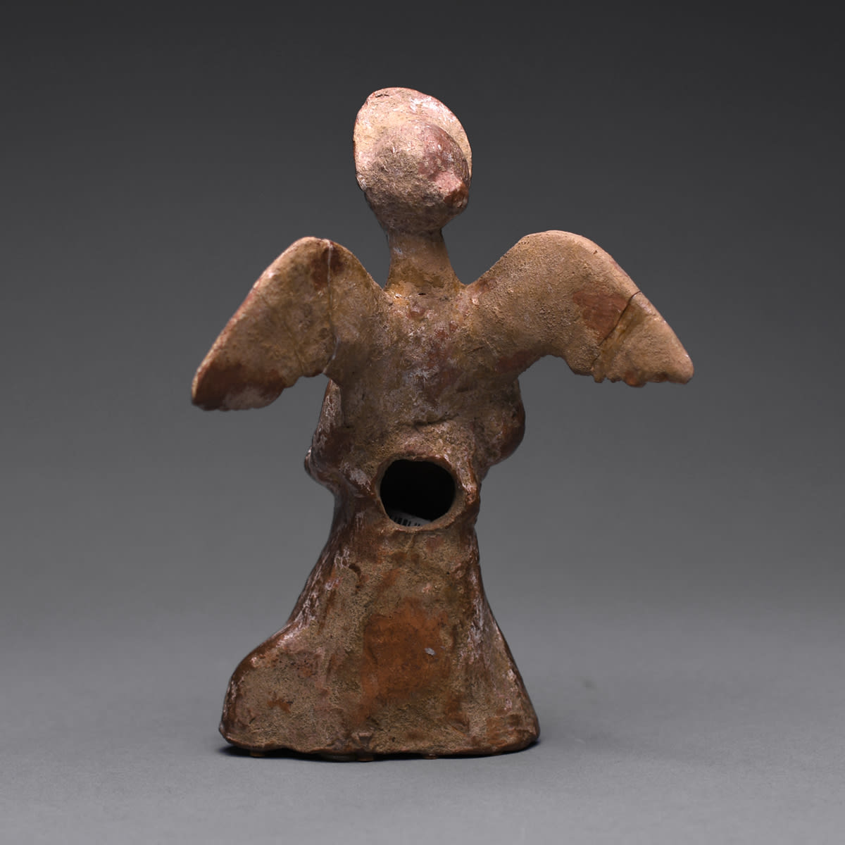 A Hellenistic Terracotta Statue of a Winged Woman, 5th Century BC