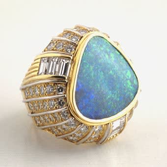 Diamond Studded Gold Ring Featuring an Australian Opal
