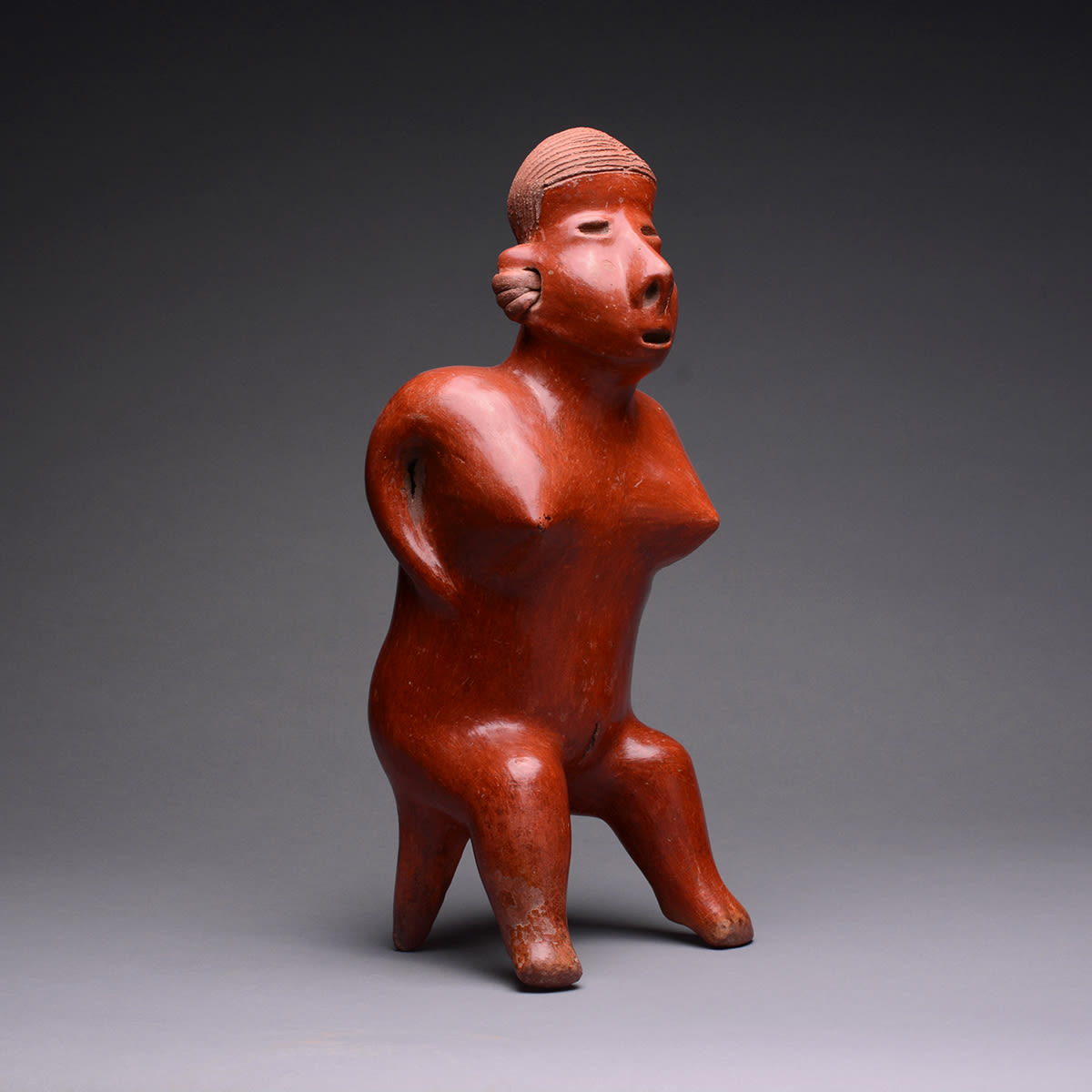San Sebastián Style Nayarit Terracotta Sculpture of a Seated Woman, 300 BCE - 300 CE