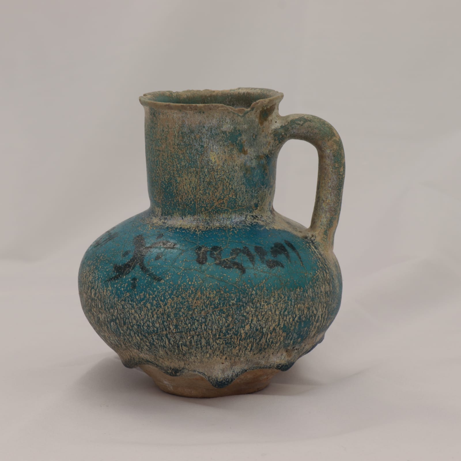 Kashan Turquoise-Blue Glazed Jug, Thirteenth Century AD