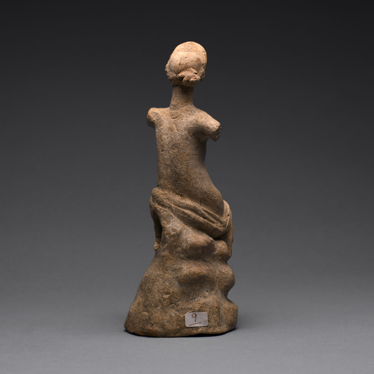 A Hellenistic Terracotta Statue of a Seated Woman