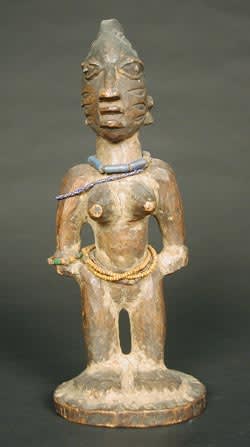 Yoruba Wooden Ibeji Doll with Cowrie Shell Cloak, 20th Century CE