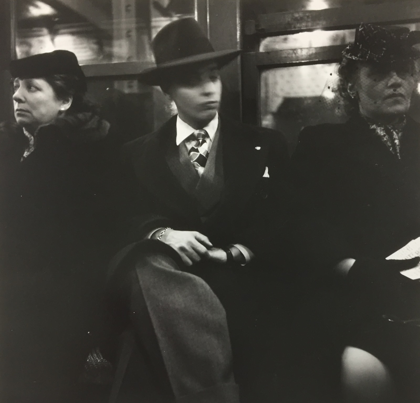 Louis Stettner, Young Man Between Two Women, 1946