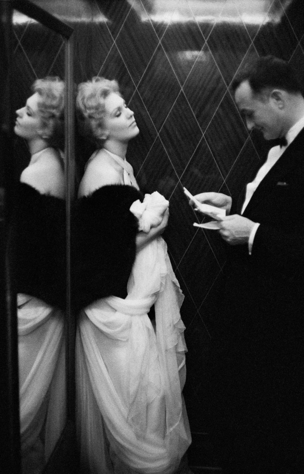 Edward Quinn, Kim Novak with Rupert Allan of LOOK magazine, Carlton Hotel, Cannes, 1956