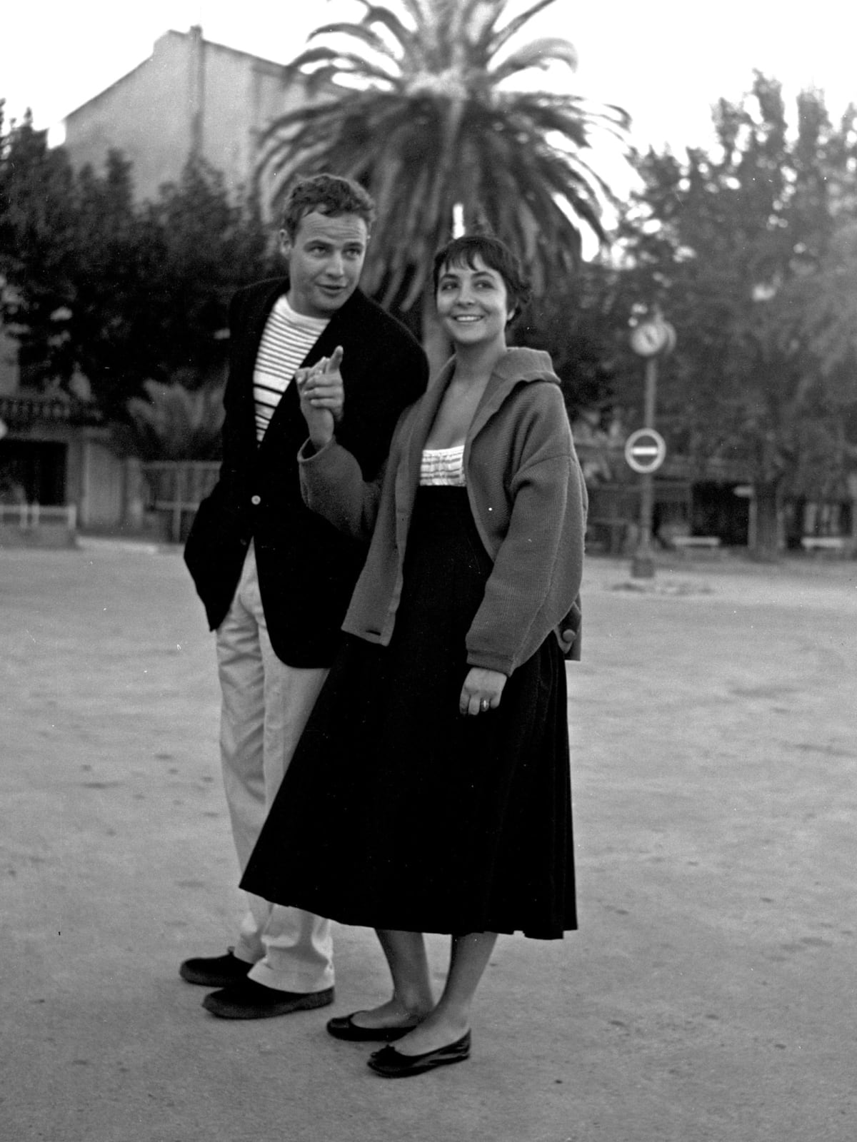 Edward Quinn, Marlon Brando with his fiancée, Bandol, 1954