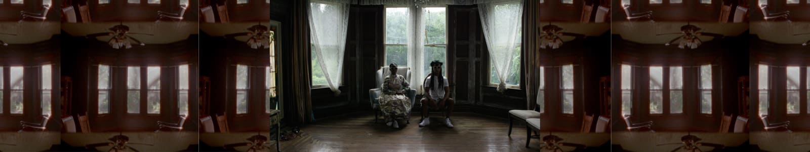Allison Janae Hamilton, Split Screen Film Still from 'A House Called Florida' (Sister and Brother in Parlor), 2022