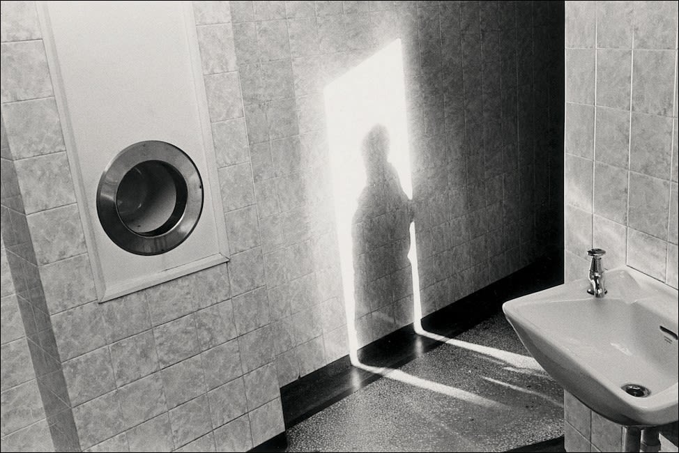 Paul Hill, Shadow on Toilet Wall, Ashbourne, 1974, 1974