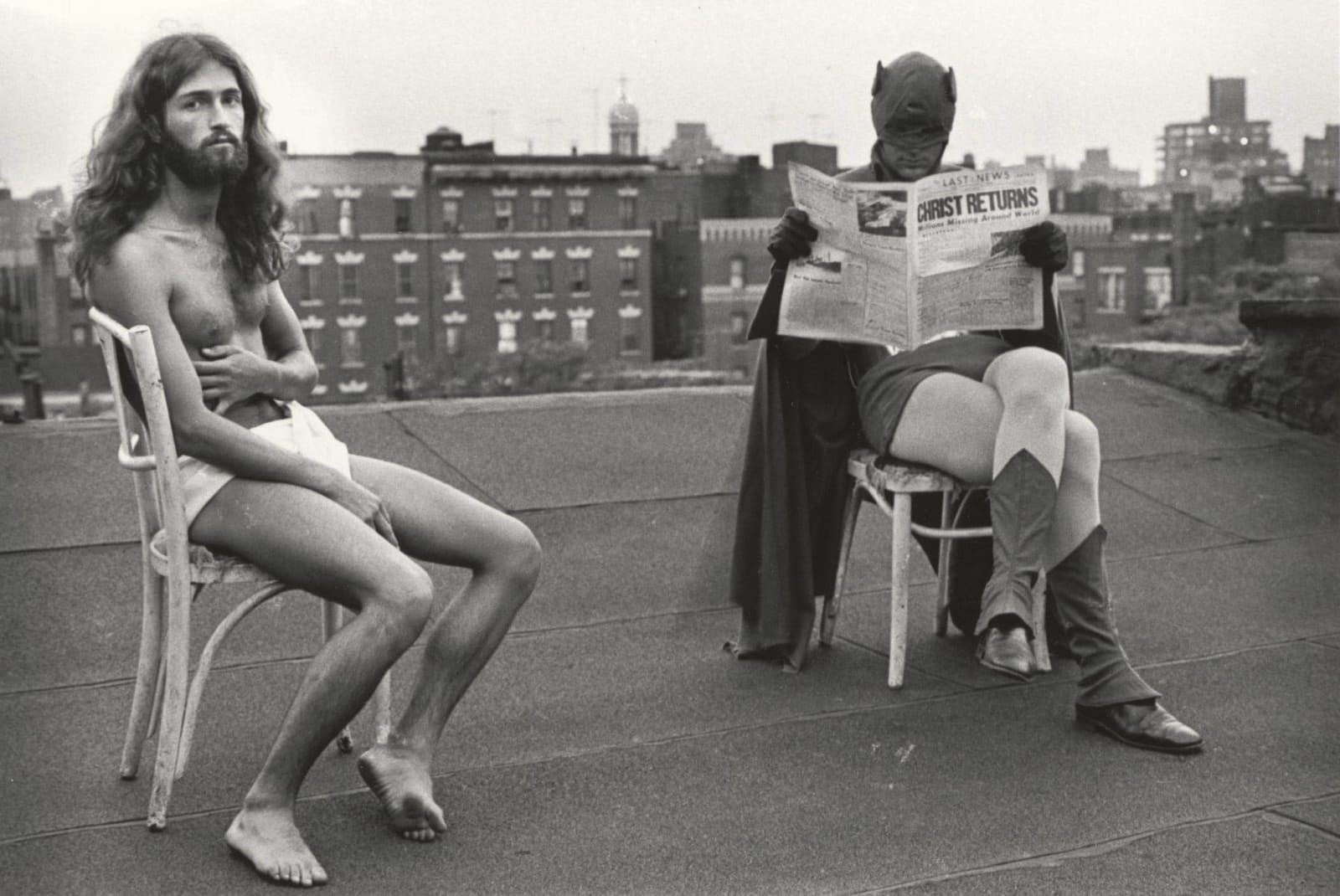 Joel-Peter Witkin, Contemporary Images of Christ: Roof: Rest After The Passion (Batman and Christ) Version 2, (Batman with Christ Returns Newspaper), 1973