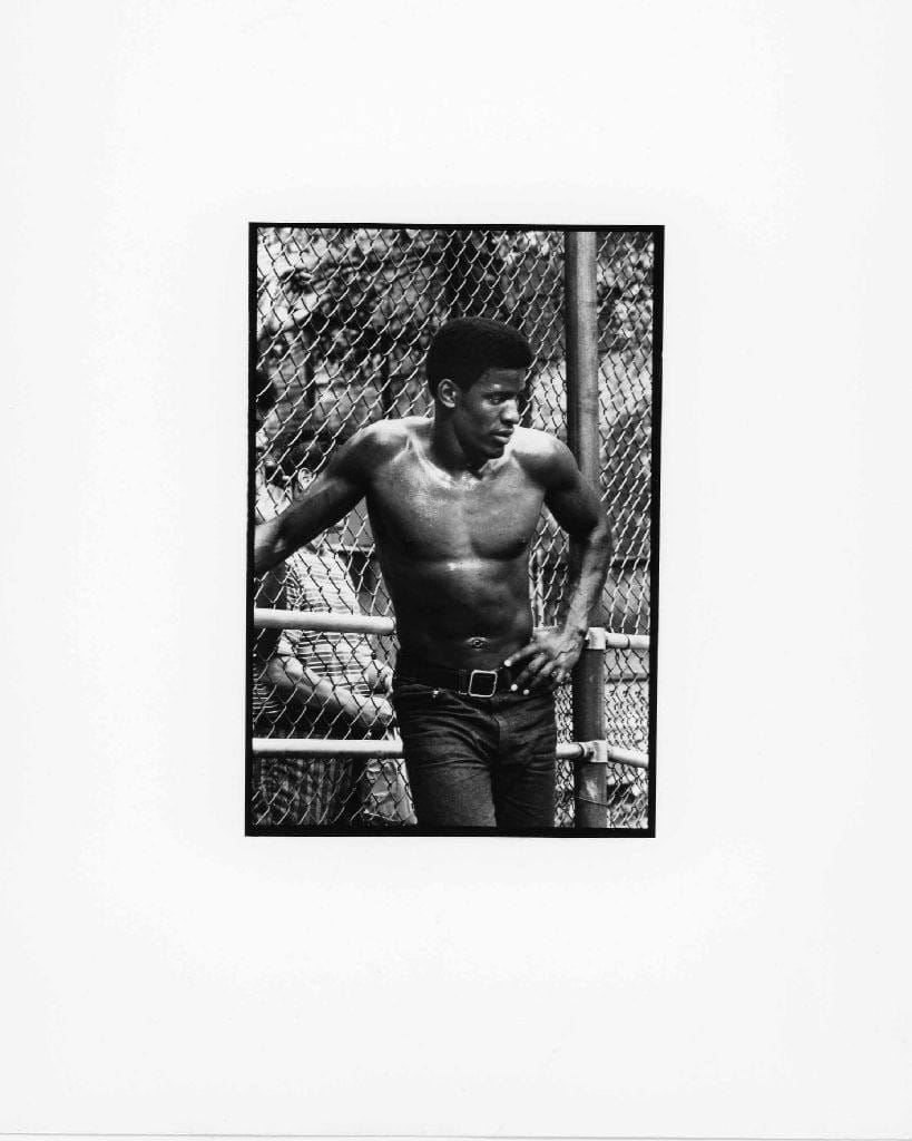 Chester Higgins, Basketball player at rest, West Village, Manhattan, 1973