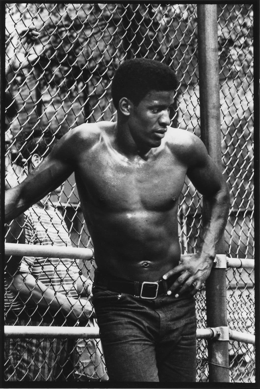 Chester Higgins, Basketball player at rest, West Village, Manhattan, 1973