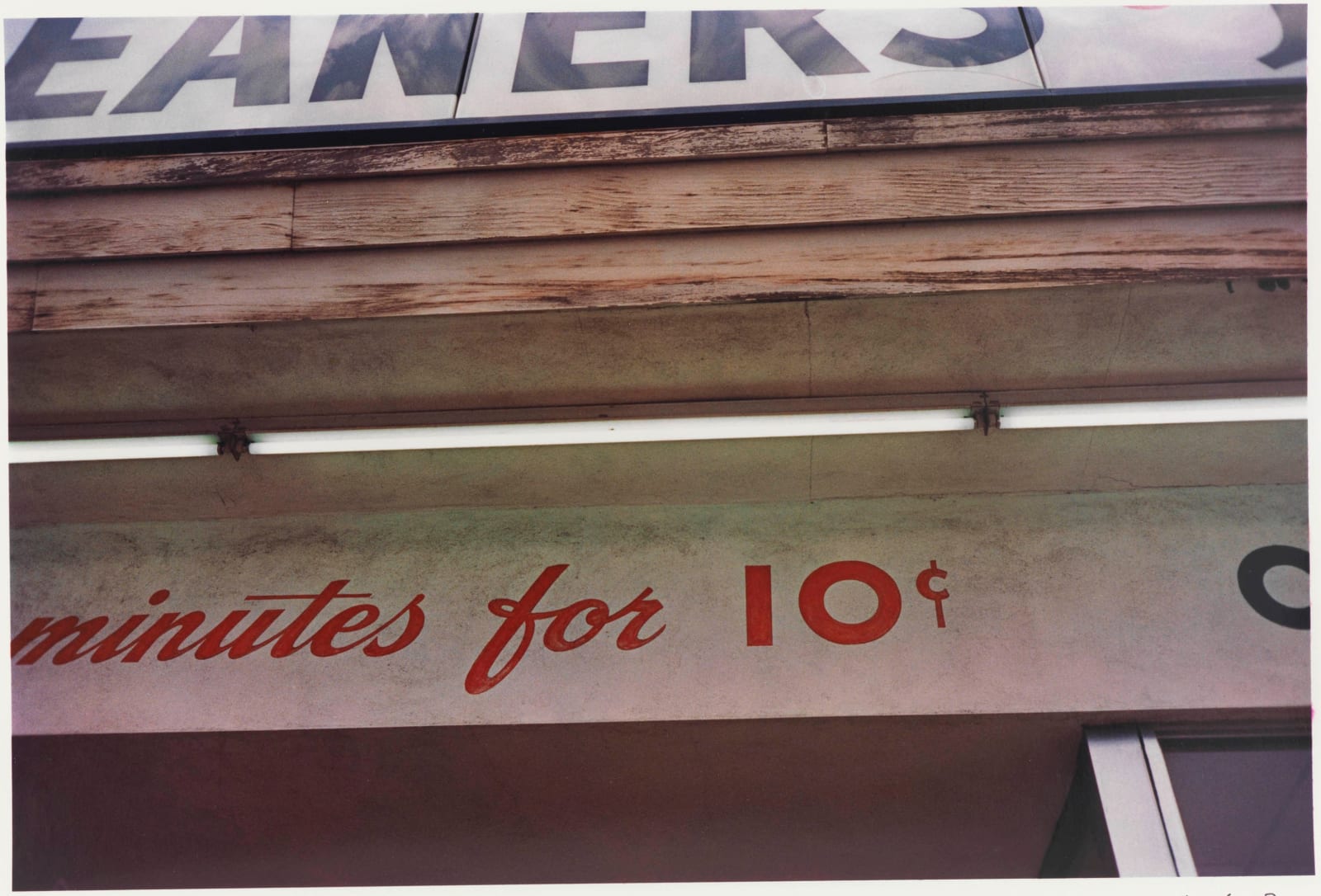 William Eggleston, UNTITLED (FLUORESCENT STRIP 10 CENTS) [FROM THE LOS ALAMOS PORTFOLIO, 1965 - 74], 1965-74