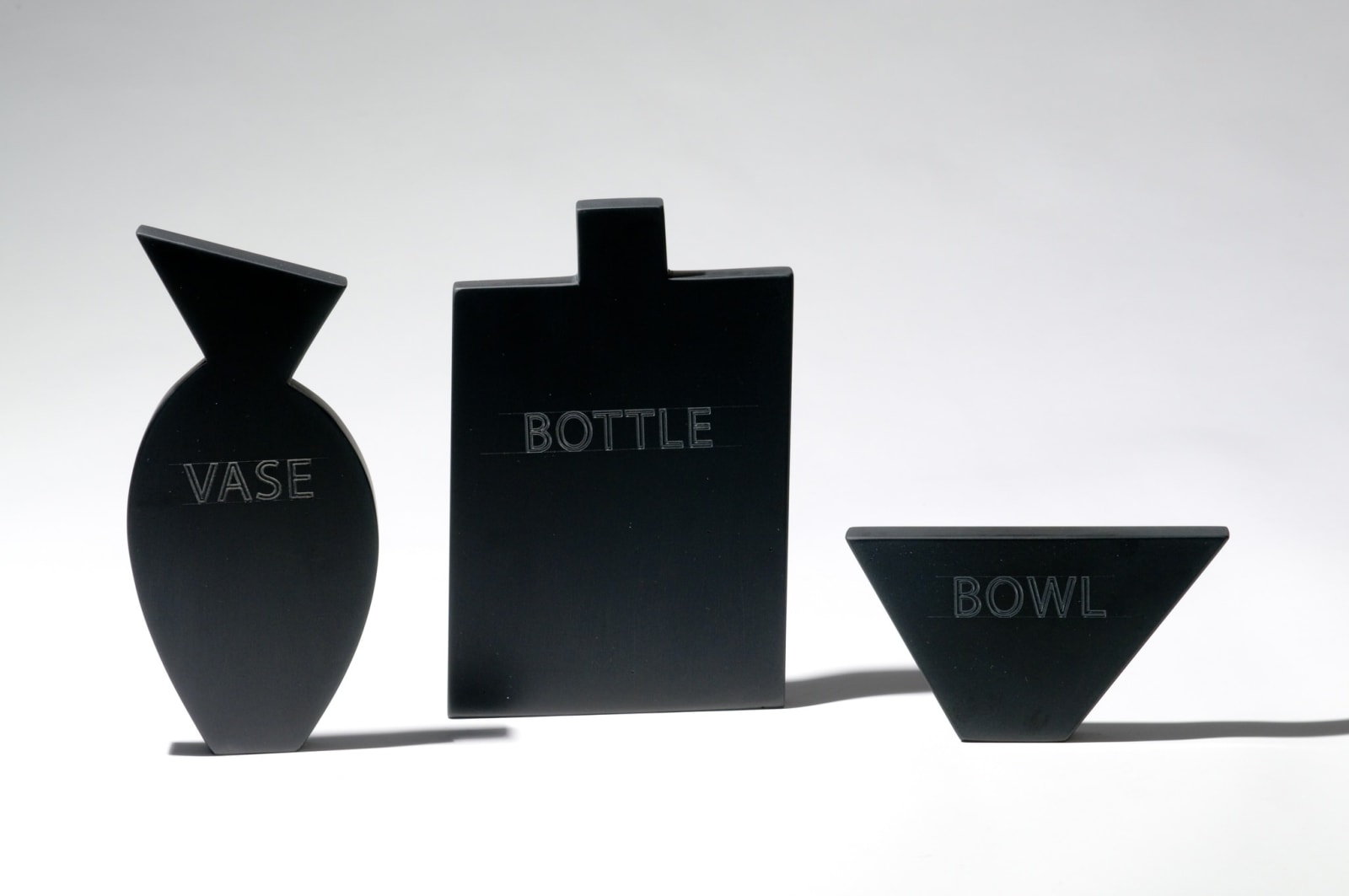 Black Vase, Bottle, Bowl (with Text)