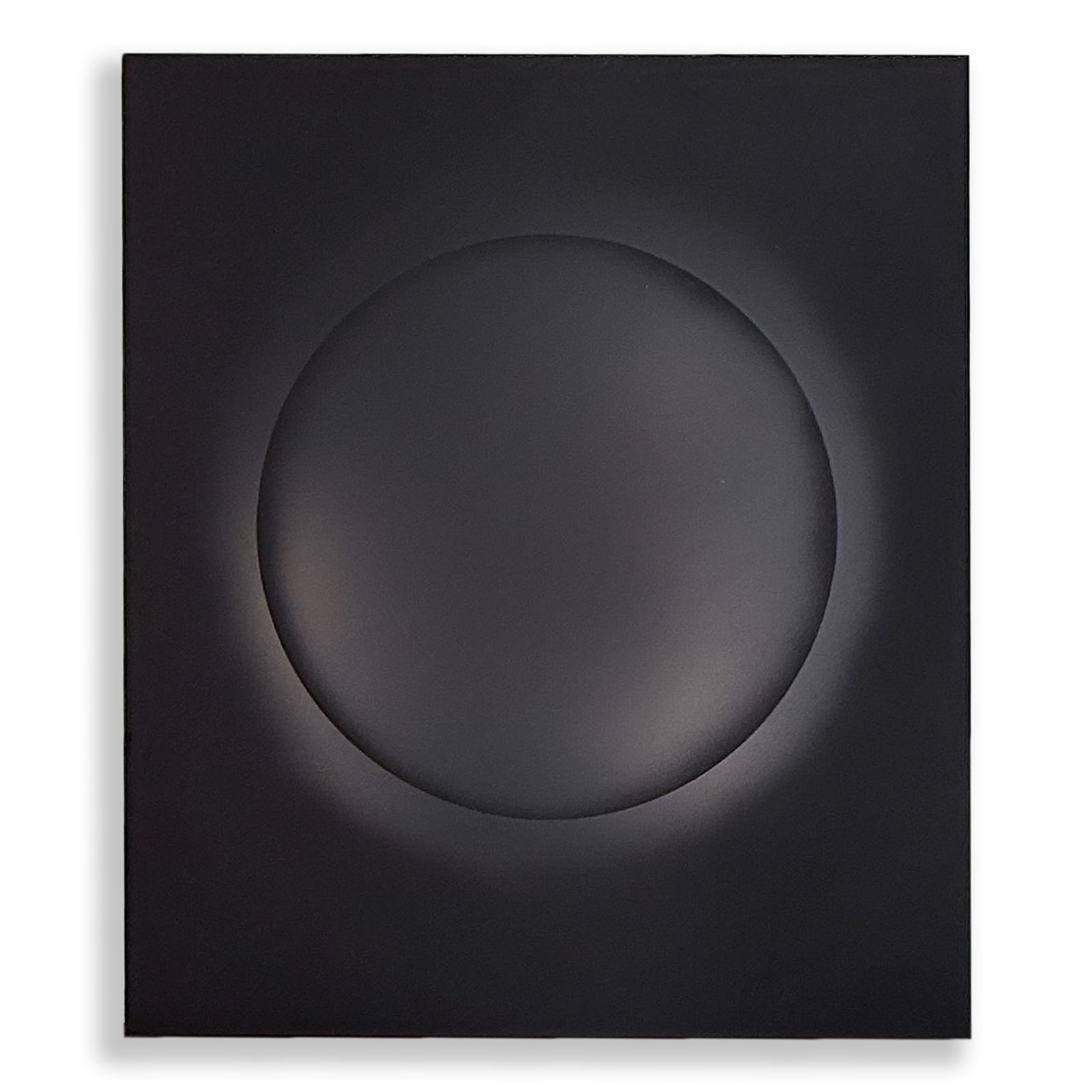 Black anodised aluminium relief sculpture by Damien Bénéteau, featuring a central circular form emerging from a flat surface.