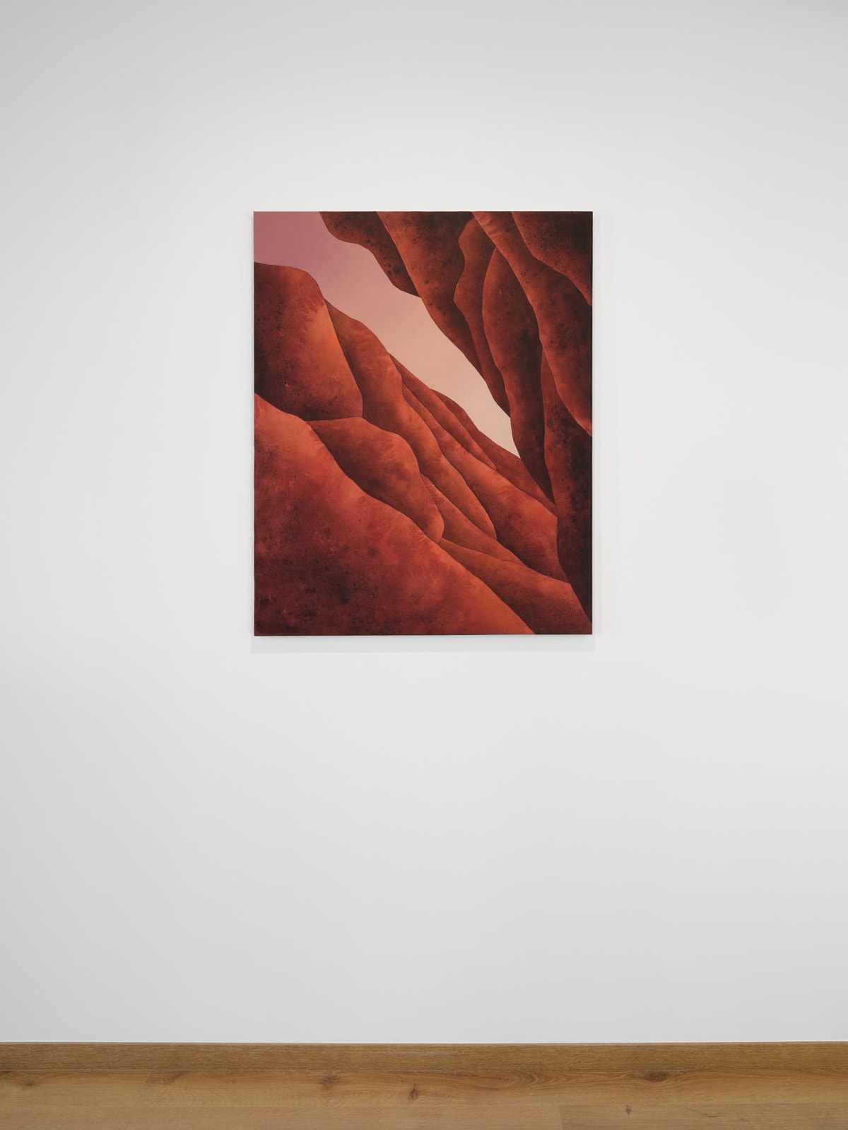 Painting titled “Titan Dunes” (2024) by Silvia Giordani. The artwork depicts an abstract desertscape with undulating dunes in rich red and earthy tones, evoking a sense of timelessness and stillness. Acrylic and oil on canvas. © Buysse Gallery.