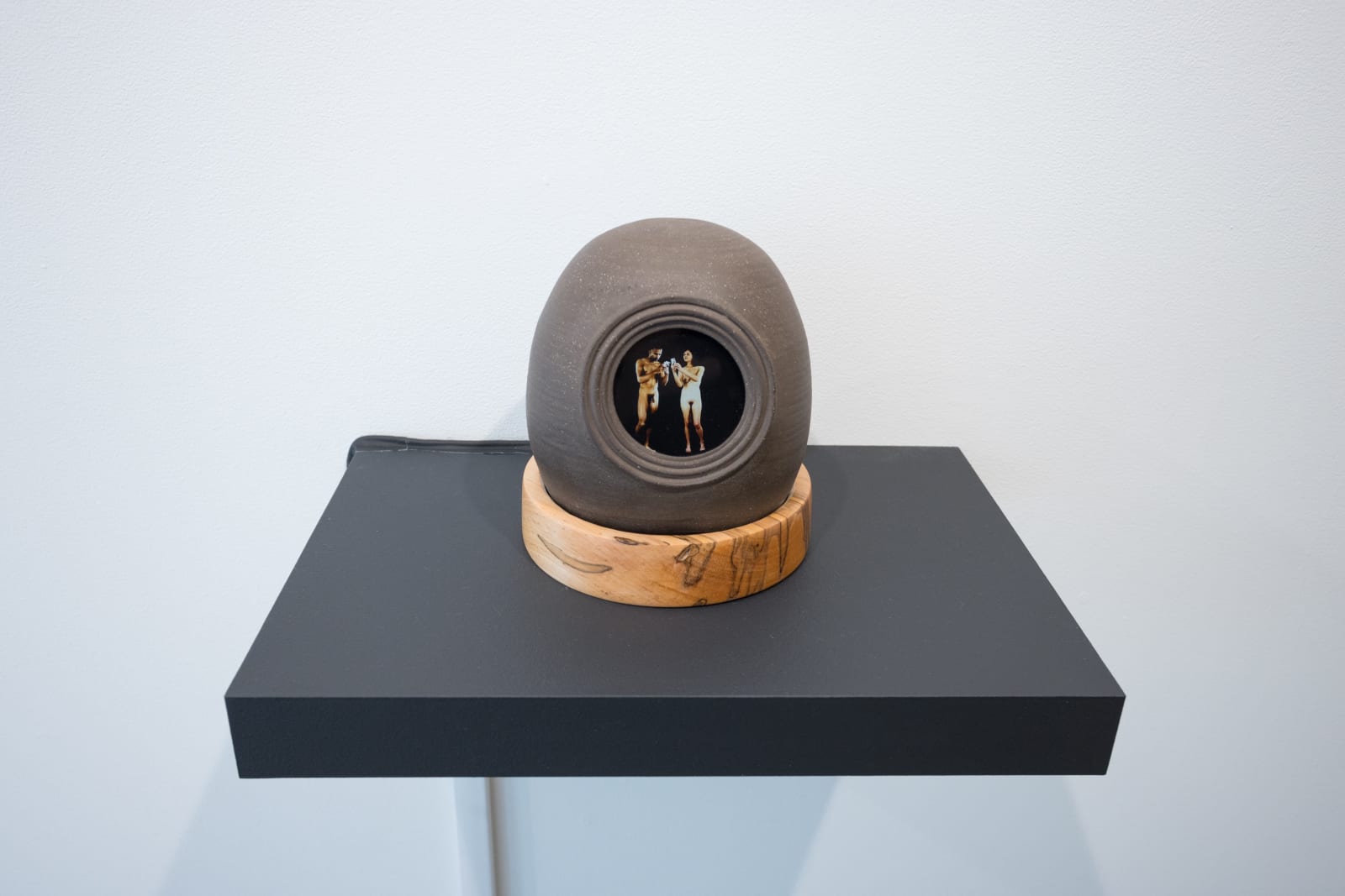 Paradise, 2023 Looping Video Sculpture, Ceramic, Video Screen, Acrylic, Turned Wood