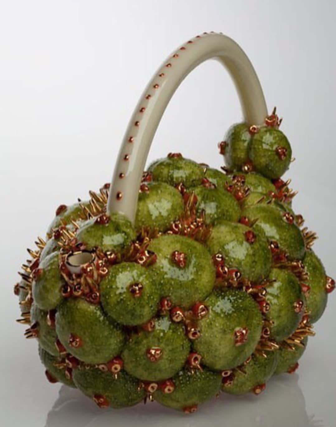 Delfina Emmanuel, Urchinea Teapot