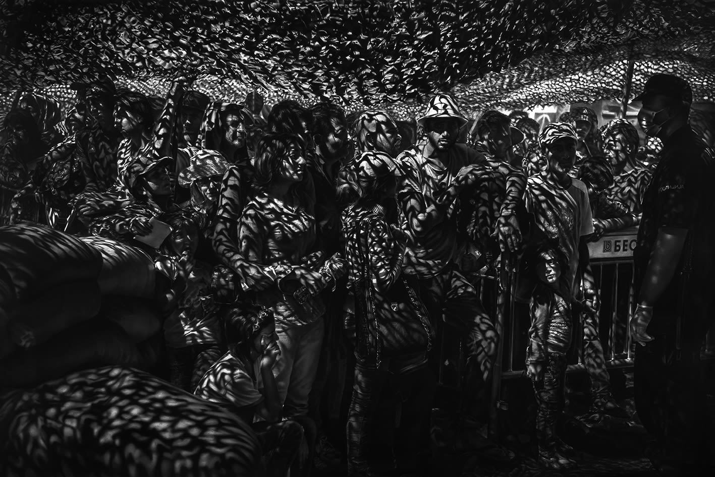 Robert Longo, Untitled (Syrian and Iraqi Refugees wait in line for documents at processing center in Presevo, Serbia, Thursday, August 27th, 2015, based on a photograph by Sergey Ponomarev), 2018