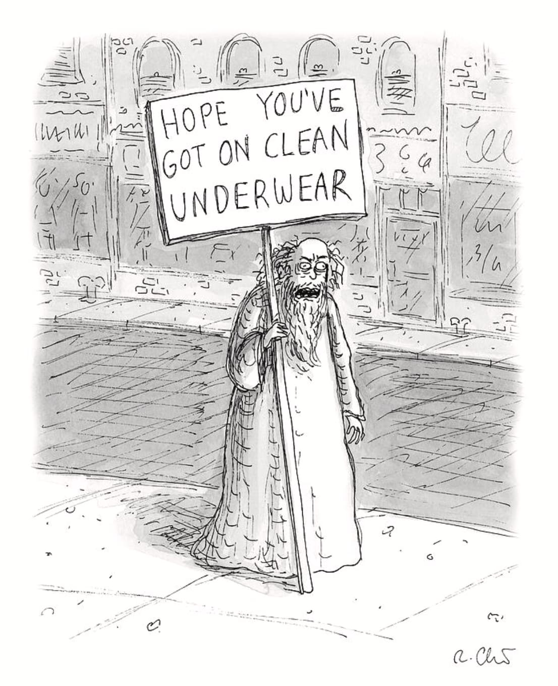 An elderly man with a beard and a long robe holds a sign that reads “HOPE YOU’VE GOT ON CLEAN UNDERWEAR.”