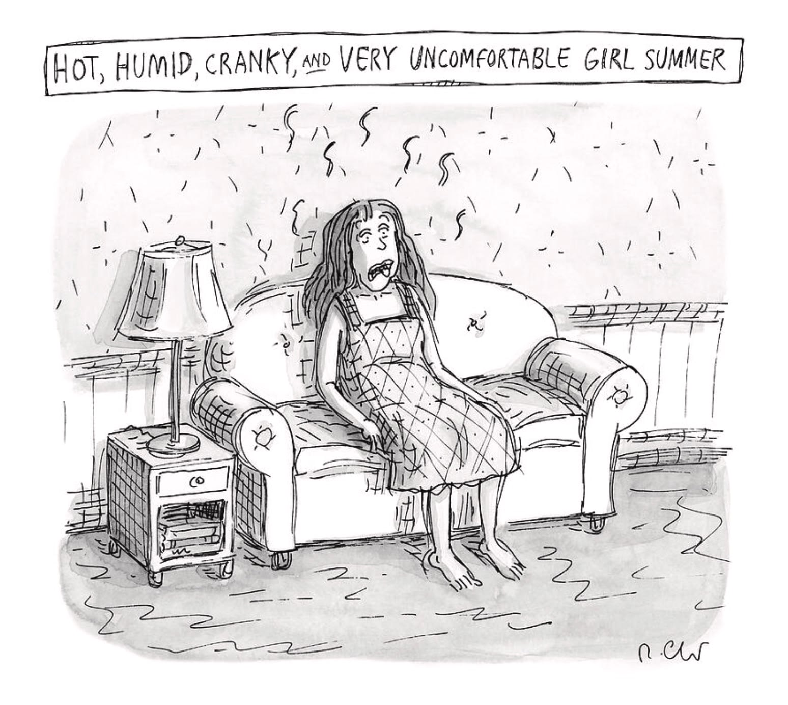 A hot and uncomfortable girl sitting on a couch.